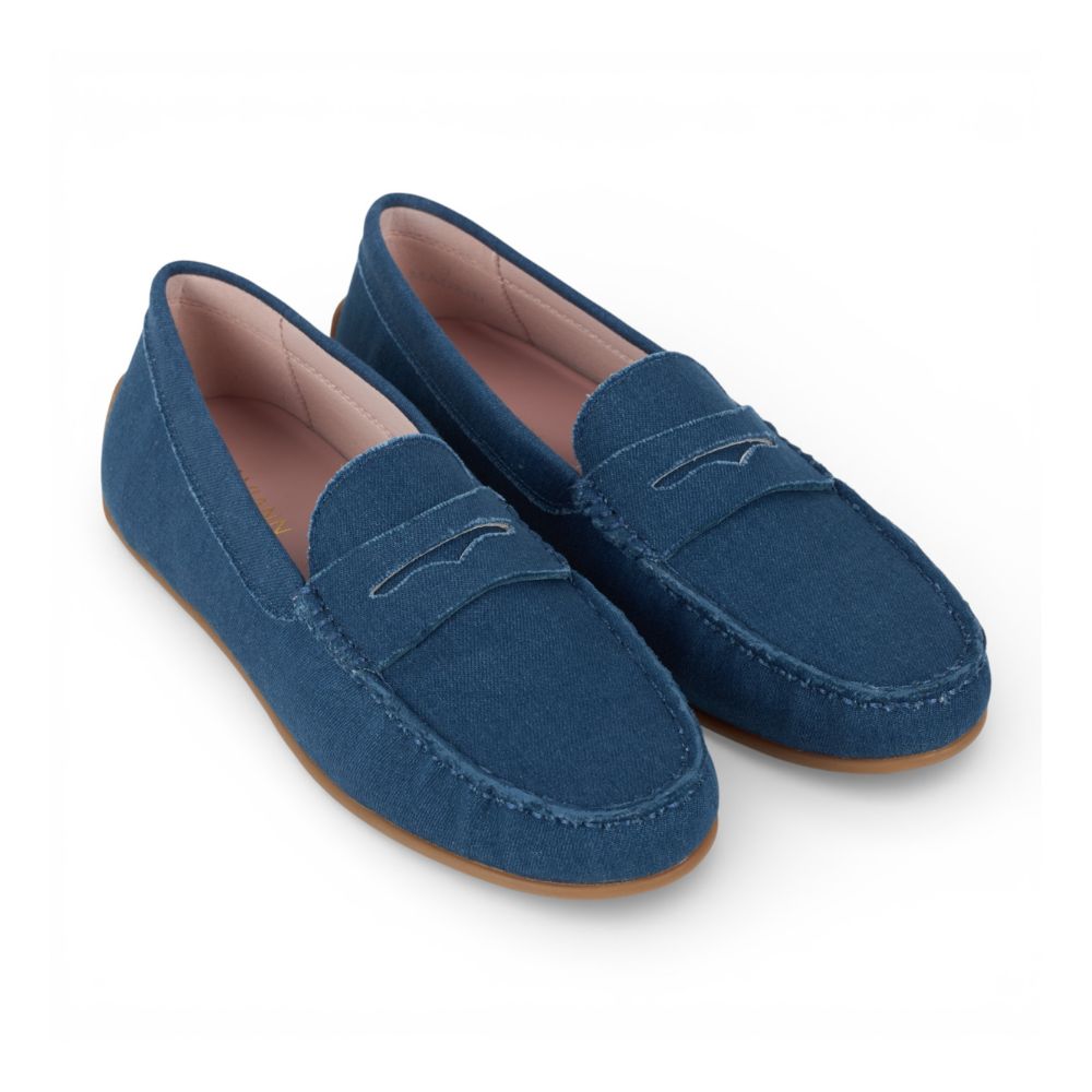 Pair of blue Madrid Denim Drive Moccasins on a white background