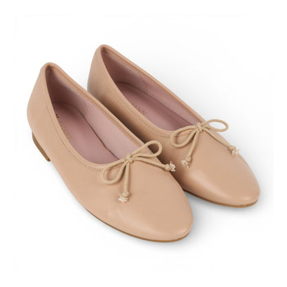 Pair of Roma Nude Leather Elegant Flat shoes with bow details on a white background