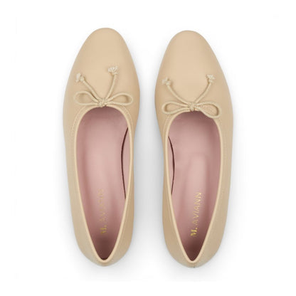 Pair of Roma Pearl Leather Elegant Flat shoes with bow details on a white background