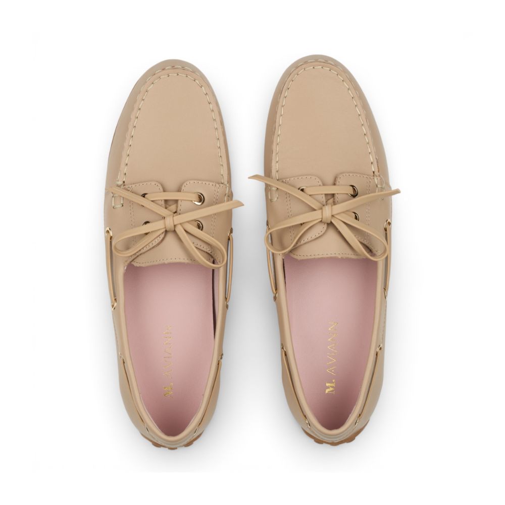 Pair of Sevilla Beige Leather Boat Moccasins shoes on a white background