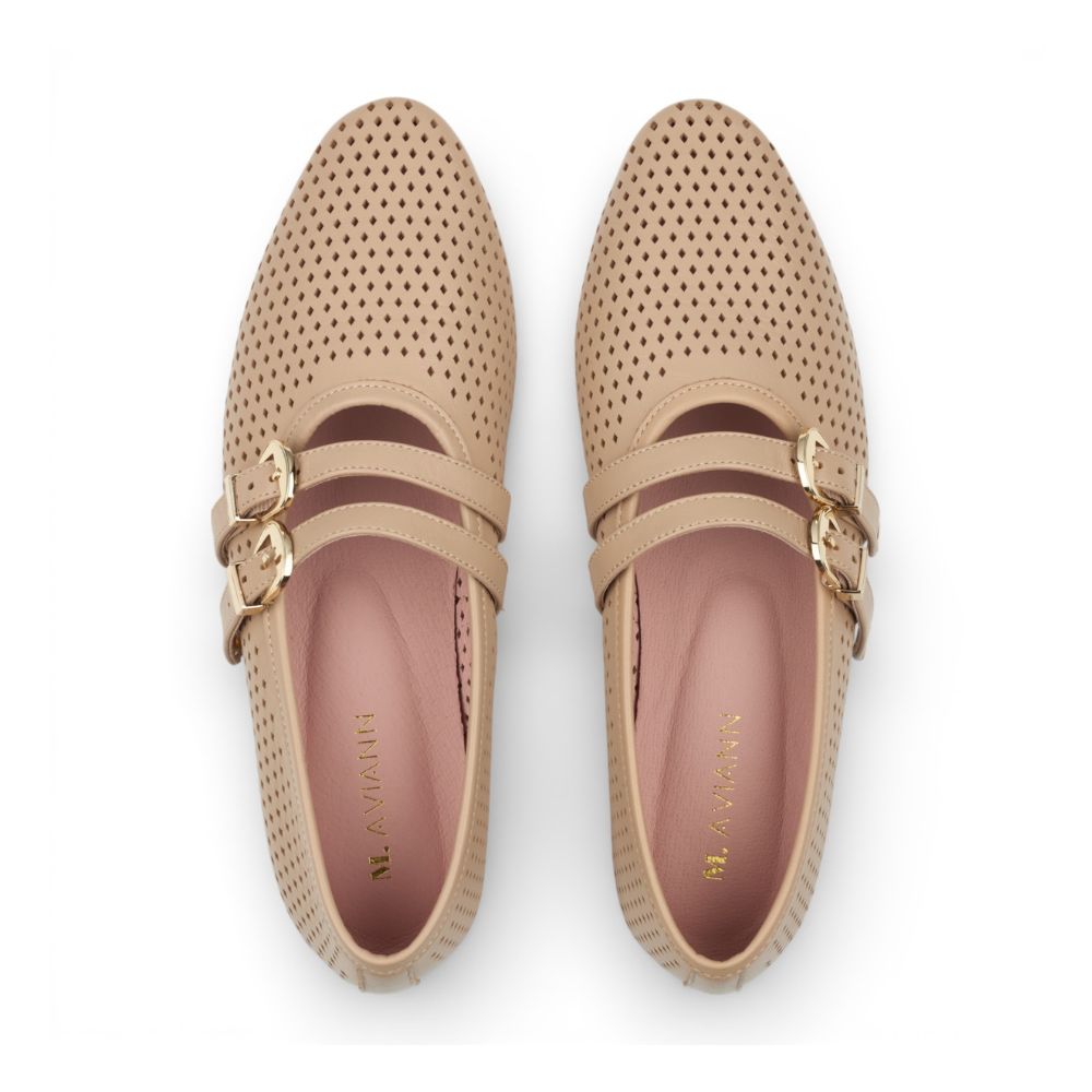 Pair of Dover Powder Perforated Leather Flat with Double Strap Detail with gold accents on a white background