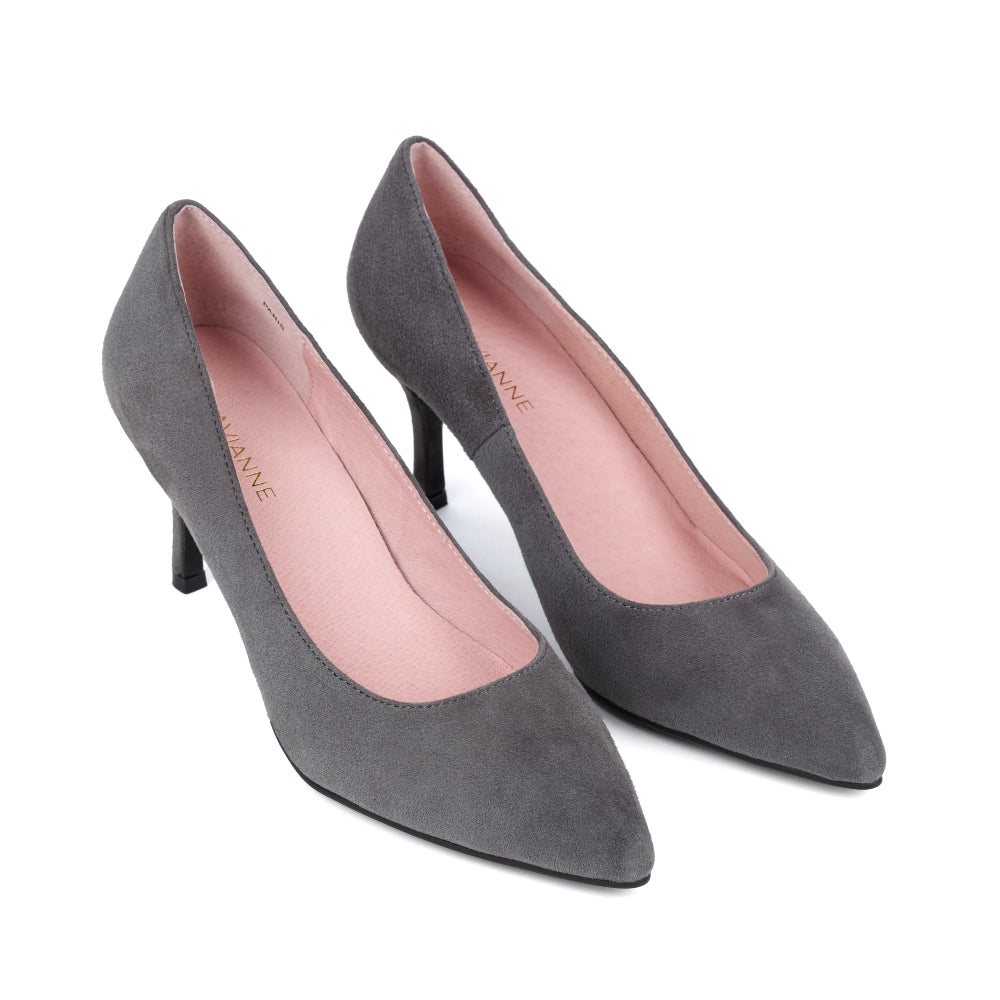 Paris Suede Heels in Grey worn by a model, demonstrating their versatility and chic sophistication for both professional and casual looks.